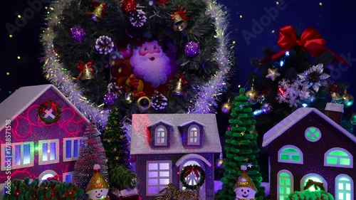 Against the backdrop of a large Christmas tree and a Christmas wreath in a Christmas village, colorful cars and snowmen stand in front of the houses