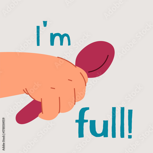 A baby s hand is holding an empty spoon. The text says I m full.