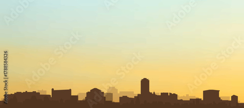 Panoramic poster of the city skyline with misty background buildings, hills sunrise, sunset and clouds of DUBLIN, IRELAND