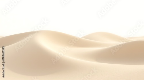 Sand dunes with a white background create a serene and minimalist scene