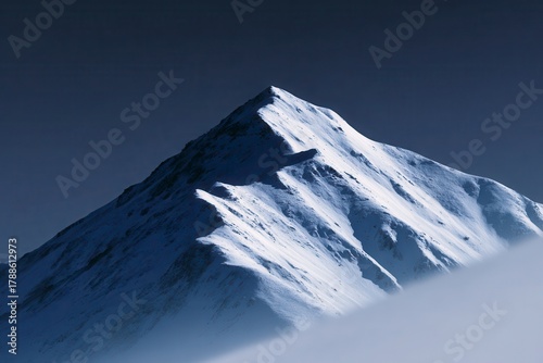 Snowy Mountain Ridge under Deep Blue Sky