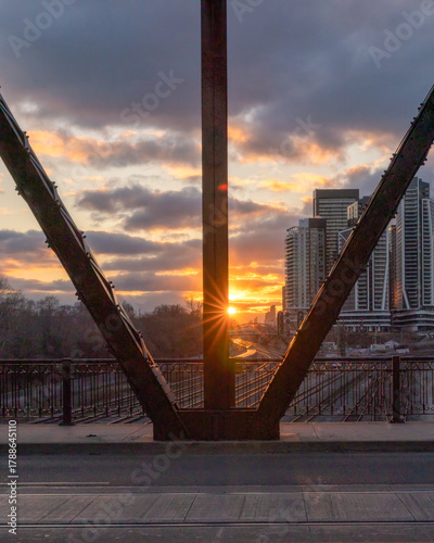 Train tracks heading towards Union Station at Bathhurst Street during sunset - Toronto Ontario