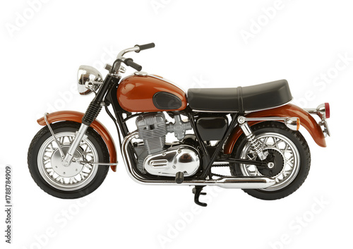 A classic orange and black motorcycle with chrome details, isolated on a white background.