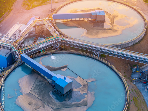 Bild auf Leinwand Aerial view of industrial water treatment facility with sedimentation tanks pulp