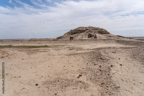 Ruins in Uruk, Iraq, display ancient brick structures amid arid landscapes
