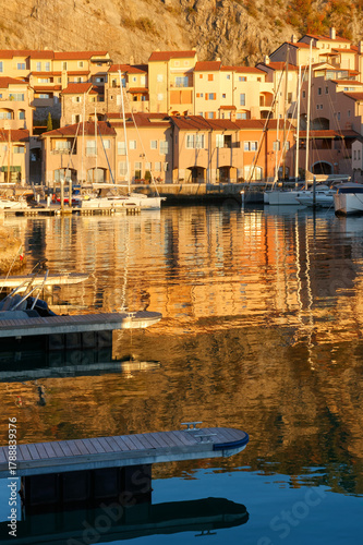 Portopiccolo seaside resort and marina during an autumn sunset, on the Trieste coast, Italy