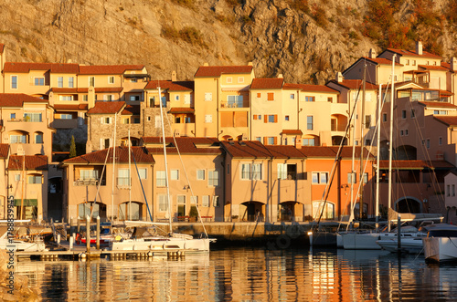 Portopiccolo seaside resort and marina during an autumn sunset, on the Trieste coast, Italy