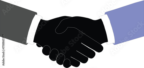 Close-up of two business people shaking hands in formal attire Keywords: handshake, business, agreement, deal, partnership, cooperation, success, meeting