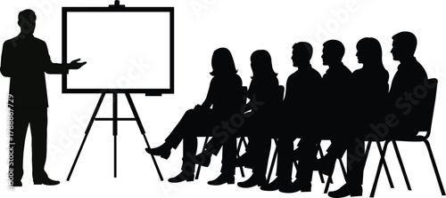 Silhouette of a man presenting to an audience seated in chairs Keywords: presentation, meeting, audience, speaker, lecture, seminar, conference, business