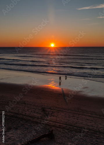 Walk on the Beach at Sunset