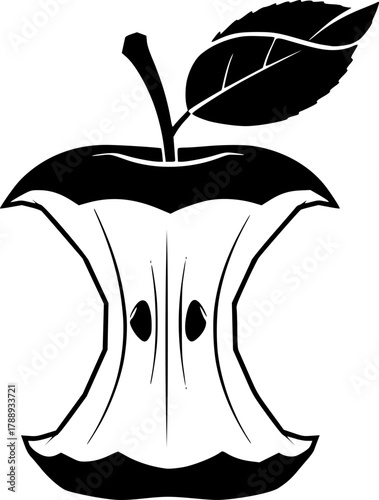 Black apple core with stem and one leaf remains after being partially eaten
