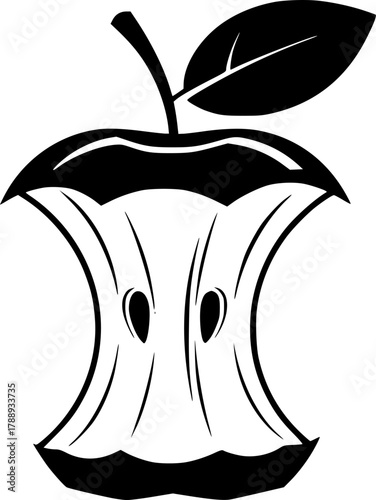 Black apple core with stem and one leaf remains after being partially eaten
