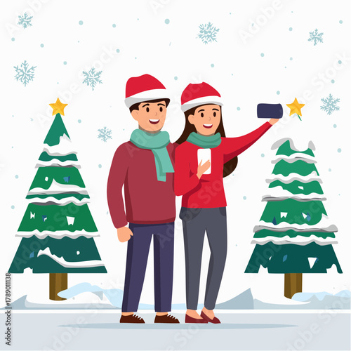 A couple in Santa hats takes a selfie in a snowy winter landscape with Christmas trees.