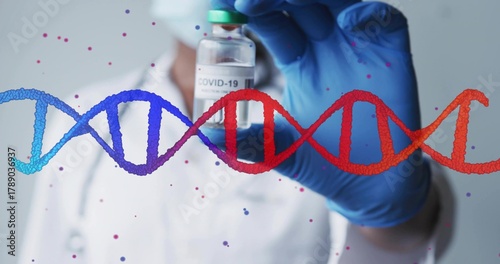 Holding medical worker in lab coat, mask, blue gloves showing COVID-19 vial with DNA helix overlay