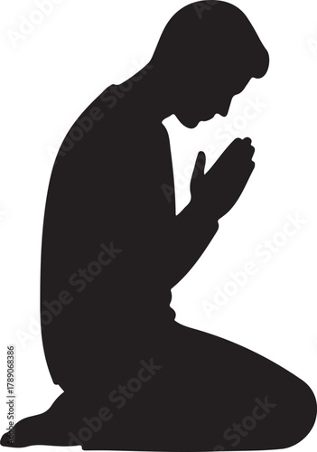  Silhouette of a man kneeling in prayer, worship, or contemplation, representing spirituality, devotion, and peace