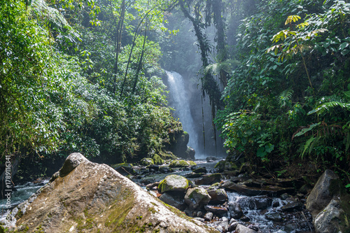 Landscape view of La Paz Waterfall (Catarata de La Paz) in a lush forest (Alajuela, Costa Rica). 