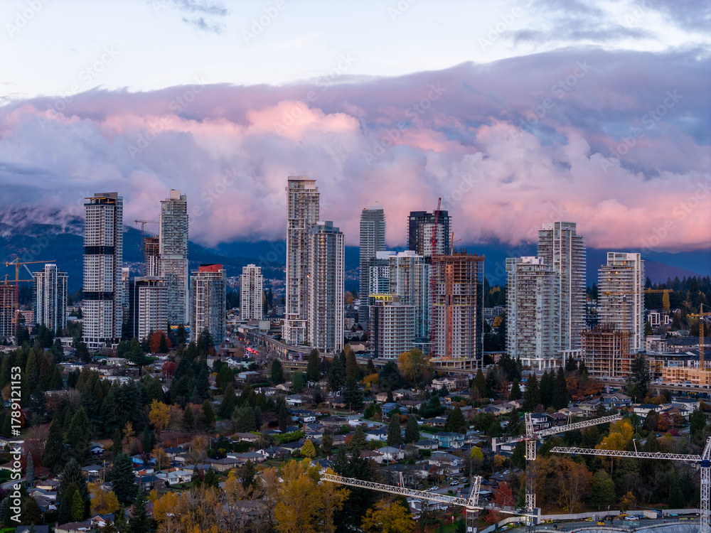 Fototapeta premium Dramatic Burnaby Skyline With High Rise Buildings In Greater Vancouver At Sunset