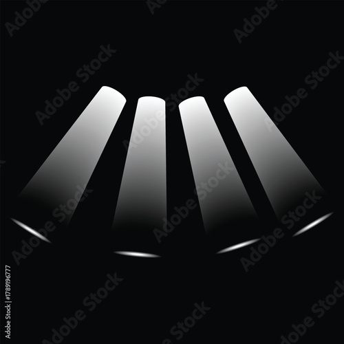 Four spotlight beams cast bright, white rays downward against a stark, dark backdrop with transparency