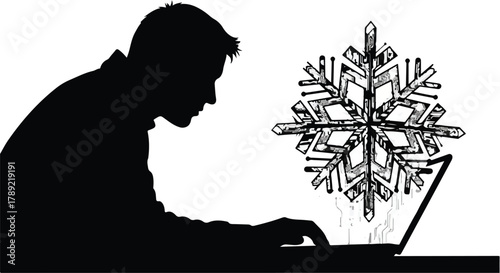 Silhouette of person working on laptop with snowflake graphic emerging from screen
