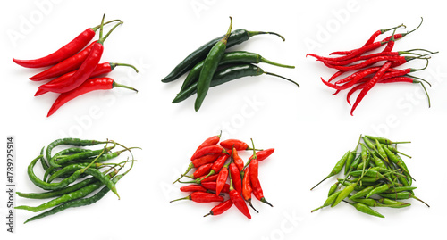 A collection set of Indonesian chili shots, top view of large red and green chili (cabe besar), curly chili (cabe keriting), and bird's eye chili (cabe rawit). A bundle of traditional ingredient.