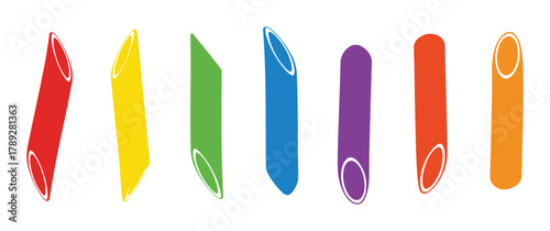 Collection of different colored penne pasta tubes. Rainbow assortment of culinary ingredients.