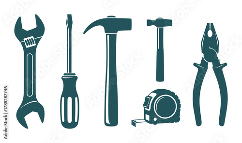 Collection of workshop tools. Spanner, screwdriver, hammer, tape measure, pliers. Industrial.