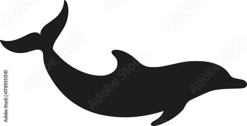 Black dolphin silhouette leaping gracefully on white background