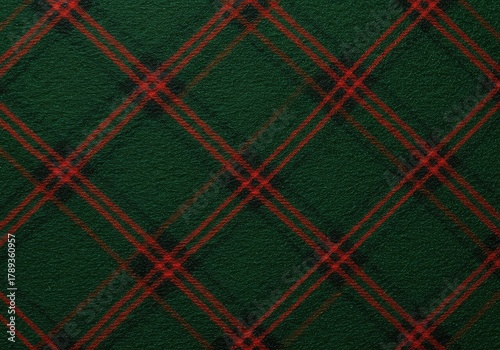 A classic red and green tartan plaid woven textile showing intricate crisscross lines and warm woolen texture suitable for traditional design work ,garment ,design ,weave