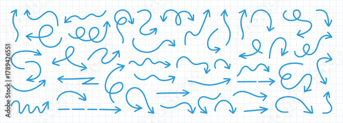Blue pen hand drawn doodle arrow collection. Blue pen lines, arrows and scribbles on grid notebook background. Sketch curved arrows design. Arrow handmade.