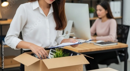 Employee Packing Belongings After Resignation A Work-Life Transition