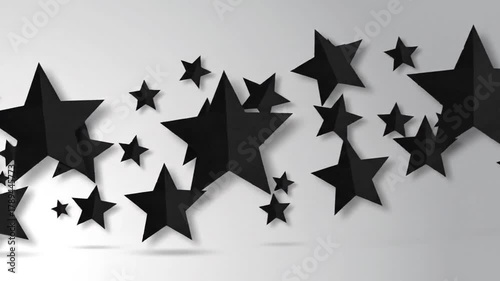 Black Paper Stars Arrangement on Light Gray Background Minimalist Composition Celebration Concept Five Pointed Star Shapes Shadow Play Abstract Decorative Design