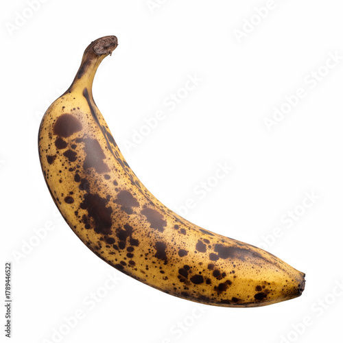 Overripe banana with dark brown spots isolated on transparent background
