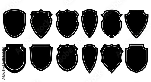 Collection of twelve diverse black medieval shield silhouettes and crest shapes isolated on white background