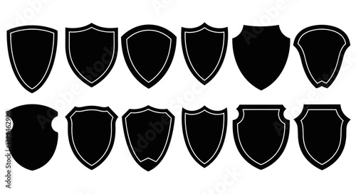 Collection of diverse black silhouette shield shapes isolated on white background