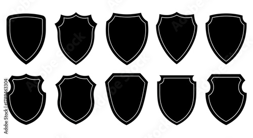 Collection of ten unique black shield silhouettes with decorative borders on a white background