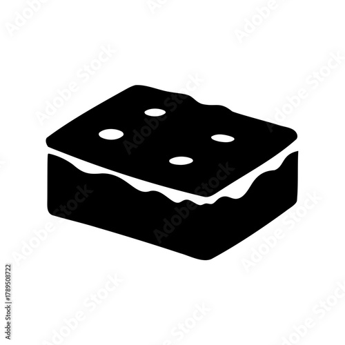 Delicious looking black and white brownie square treat tempting for the tastebuds