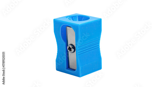 Small, bright blue pencil sharpener stands on a black background