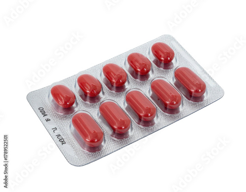 Ten red capsules in a blister pack