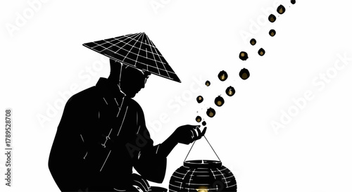 Silhouette of a person in traditional hat releasing glowing lanterns into the night sky
