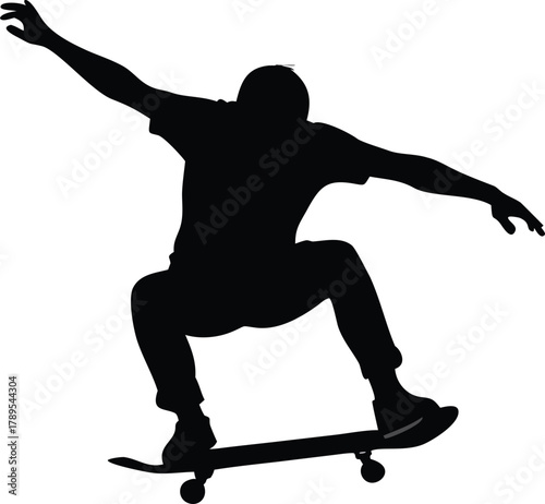A silhouette of a person performing a trick on a skateboard in