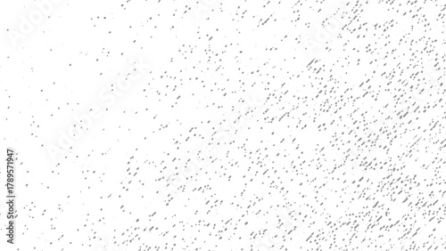 Subtle grain texture overlay with noise and grit for abstract grunge background and decoration. Monochrome grunge texture with halftone dots and splattered effect for creative background use. 