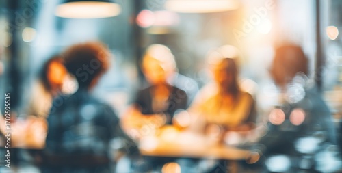 blurred photo of business people sitting around the table in an office, captured from behind and in focus, symbolizing collaboration within  company or between different quaint style icons.