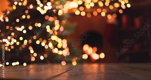 Christmas tree with illumination near the fireplace. Home decor