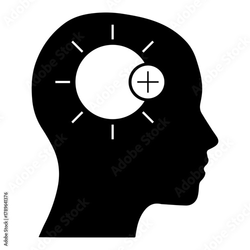 Silhouette of Human Head with Positive Thinking Lightbulb Icon for Mental Health and Innovation Concept