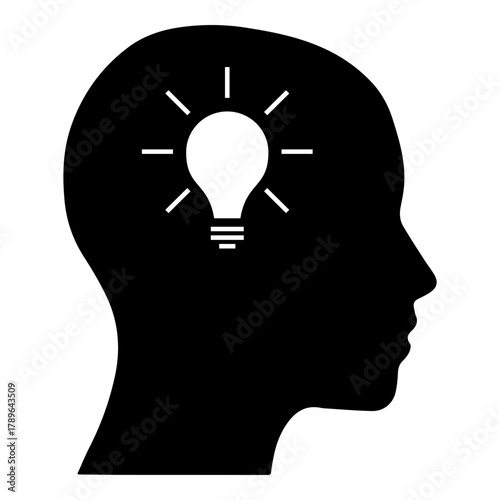 Black Silhouette of Human Head Profile with Glowing White Light Bulb Inside for Idea and Innovation Concept