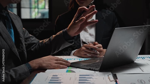 Business people discussing financial data in a meeting