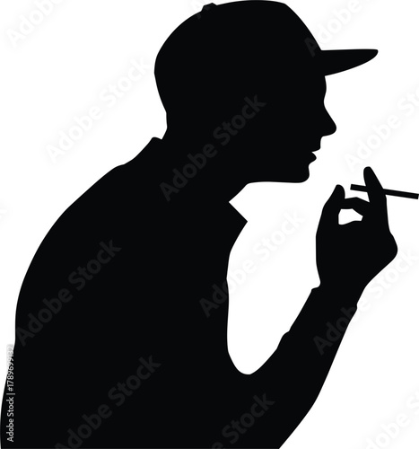 Silhouette of Man in Baseball Cap Smoking a Cigarette, Representing Nicotine Addiction, Bad Habit, Youth Culture, and Lifestyle Vices