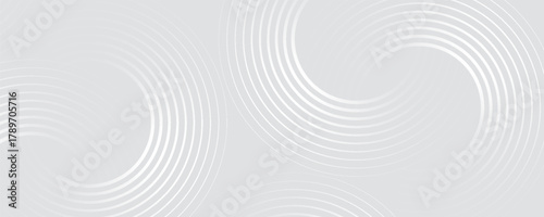 Abstract white geometric lines glowing on a gray background. Modern glossy white circle line pattern. Suitable for covers, posters, web, banners.