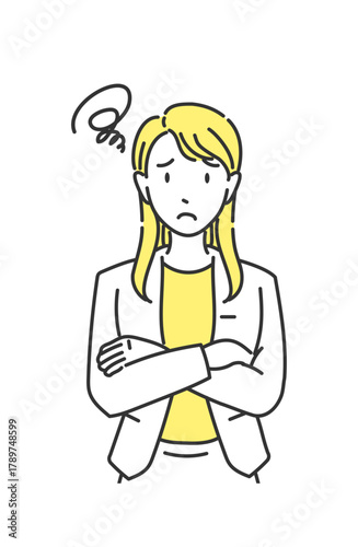 オフィスカジュアルの女性 困った表情（イエローアクセント）