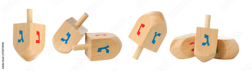 Fototapeta premium Set, Colorful Hebrew-lettered dreidels on white, isolated, PNG